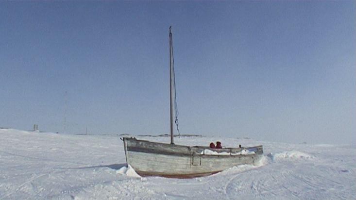 An half-buried ship in the Cambridge Bay's snow - Nanoq 2007 expedition