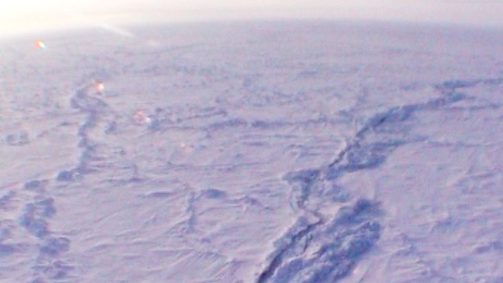 Flight in the helicopter over the Arctic Ocean - Geographic North Pole 2002 expedition