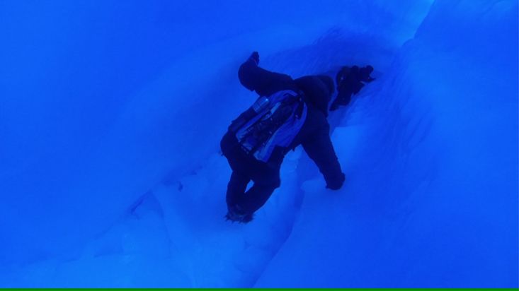 Crossing an ice tunnel in Antarctica