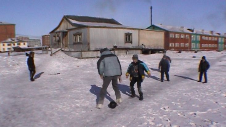 Siberian children playing football in Khatanga - Geographic North Pole 2002 expedition