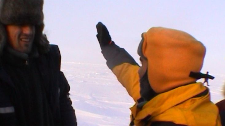 Checking the direction to the North Pole - Geographic North Pole 2002 expedition