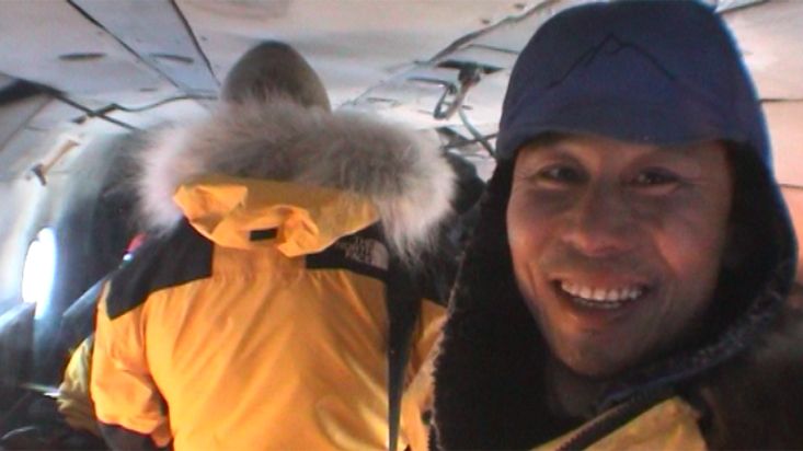 Helicopter towards to the departure point - Geographic North Pole 2002 expedition