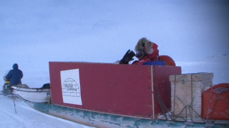 Leaving by snowmobile of the Ravenscraig's log cabin - Sam Ford Fiord 2010