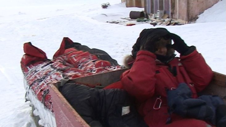 Sitting down on the sled for comeback to Clyde River - Sam Ford Fiord 2010 expedition