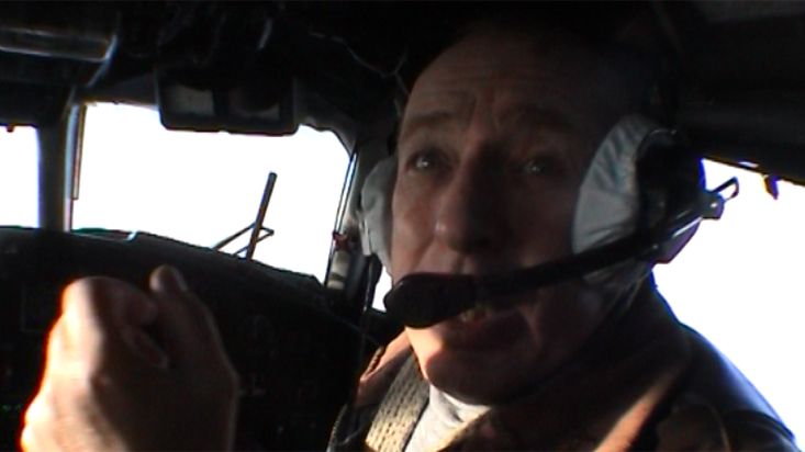 Pilot on the plane towards Arctic Ocean - Geographic North Pole 2002 expedition