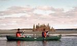 Canoeing on the lake of Sami people.