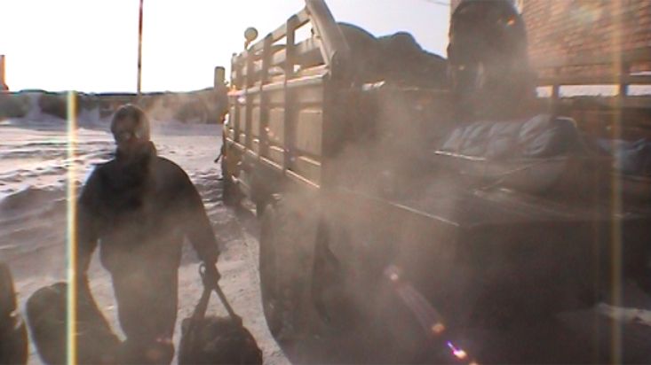 Loading the expedition equipment to the hotel in Khatanga - Geographic North Pole 2002 expedition